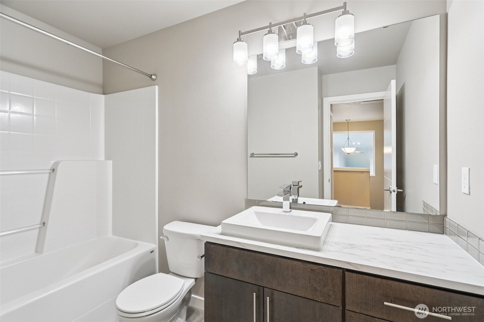 13724 Ash Way, Unit F3 Everett, WA 98204 - Photo 18 of 28 a bathroom with a sink a toilet and shower