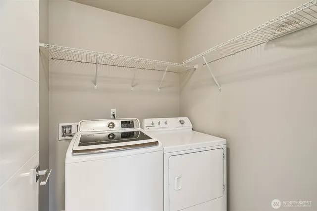a utility room with dryer and washer