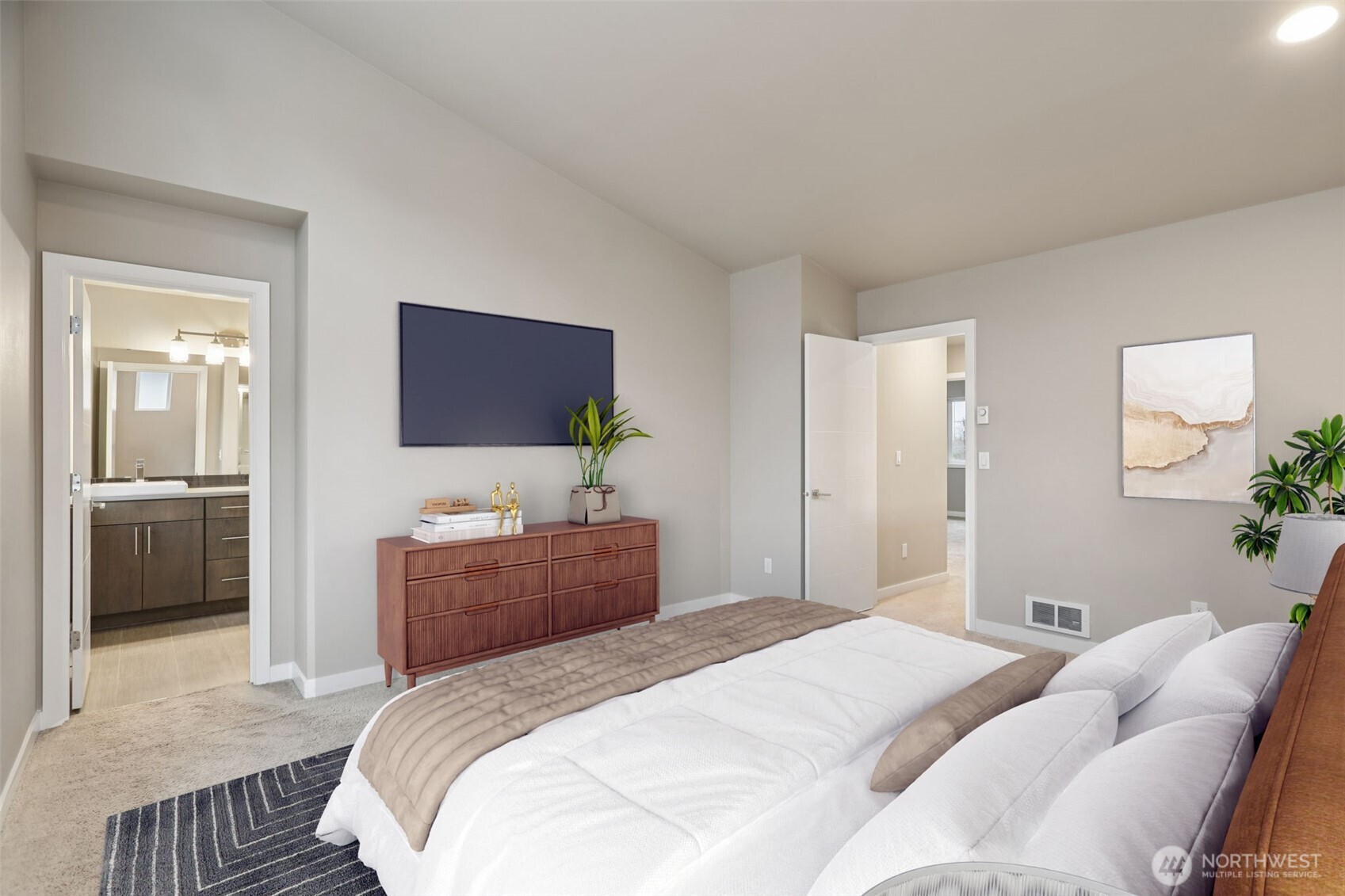 13724 Ash Way, Unit F3 Everett, WA 98204 - Photo 20 of 28 a bedroom with a bed and a couch