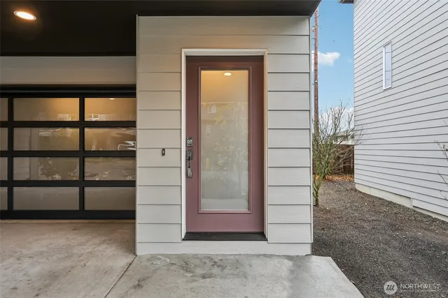 a view of a wooden door of the house
