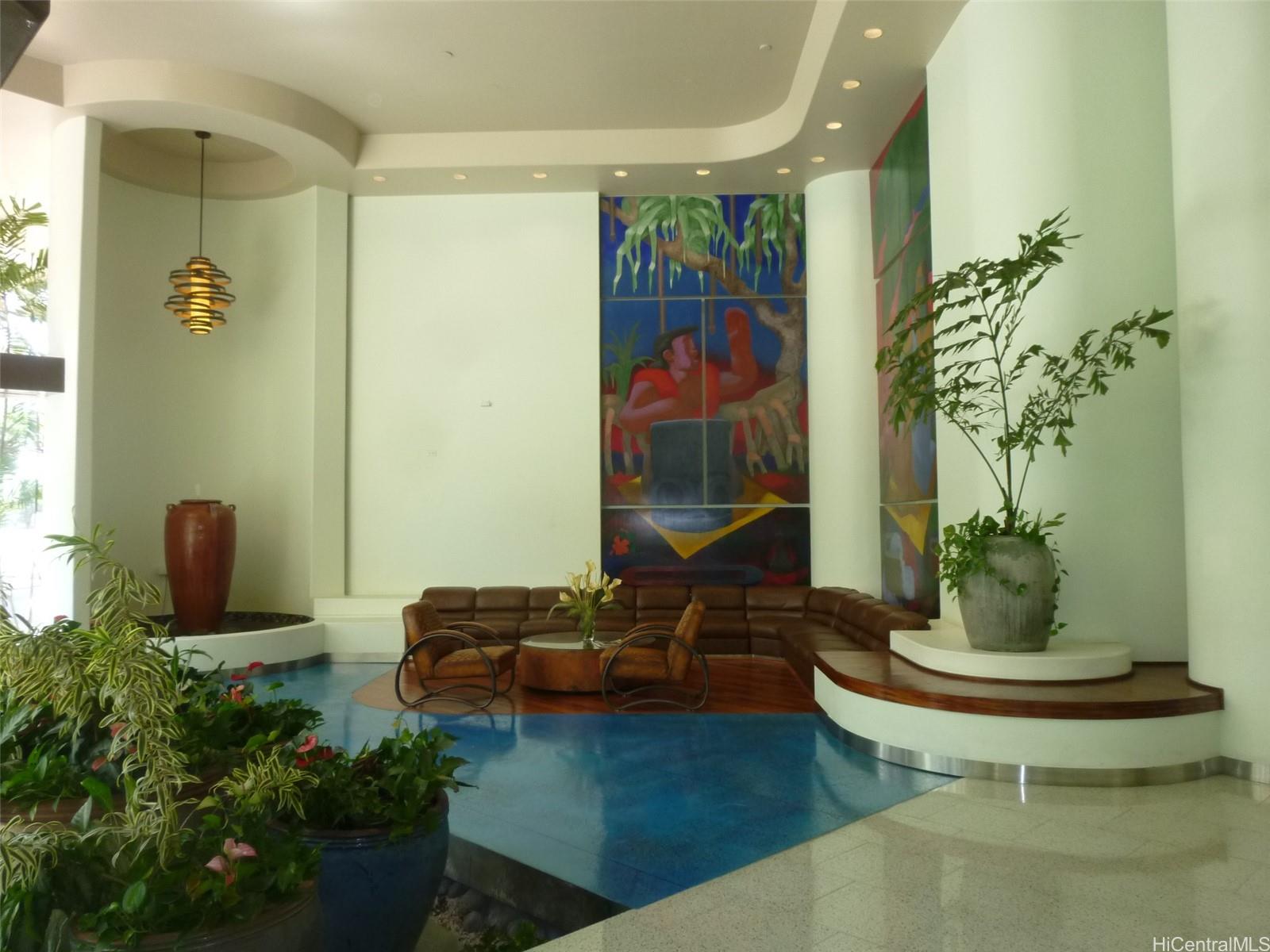 700 Richards Street, Unit 703 Honolulu, HI 96813 - Photo 11 of 12 a living room with furniture