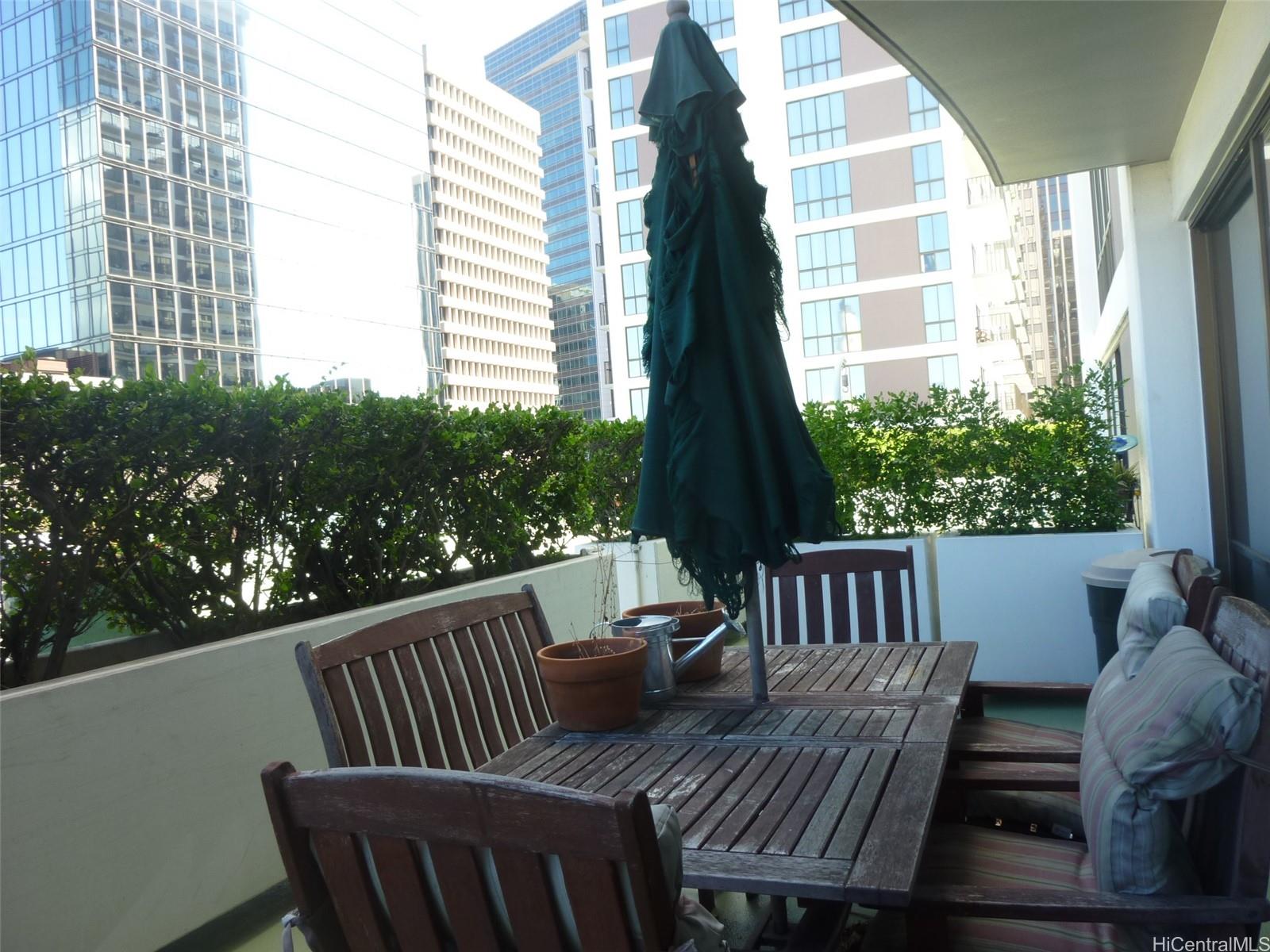 700 Richards Street, Unit 703 Honolulu, HI 96813 - Photo 5 of 12 a view of balcony with furniture
