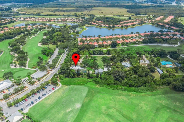 an aerial view of a garden with a patio