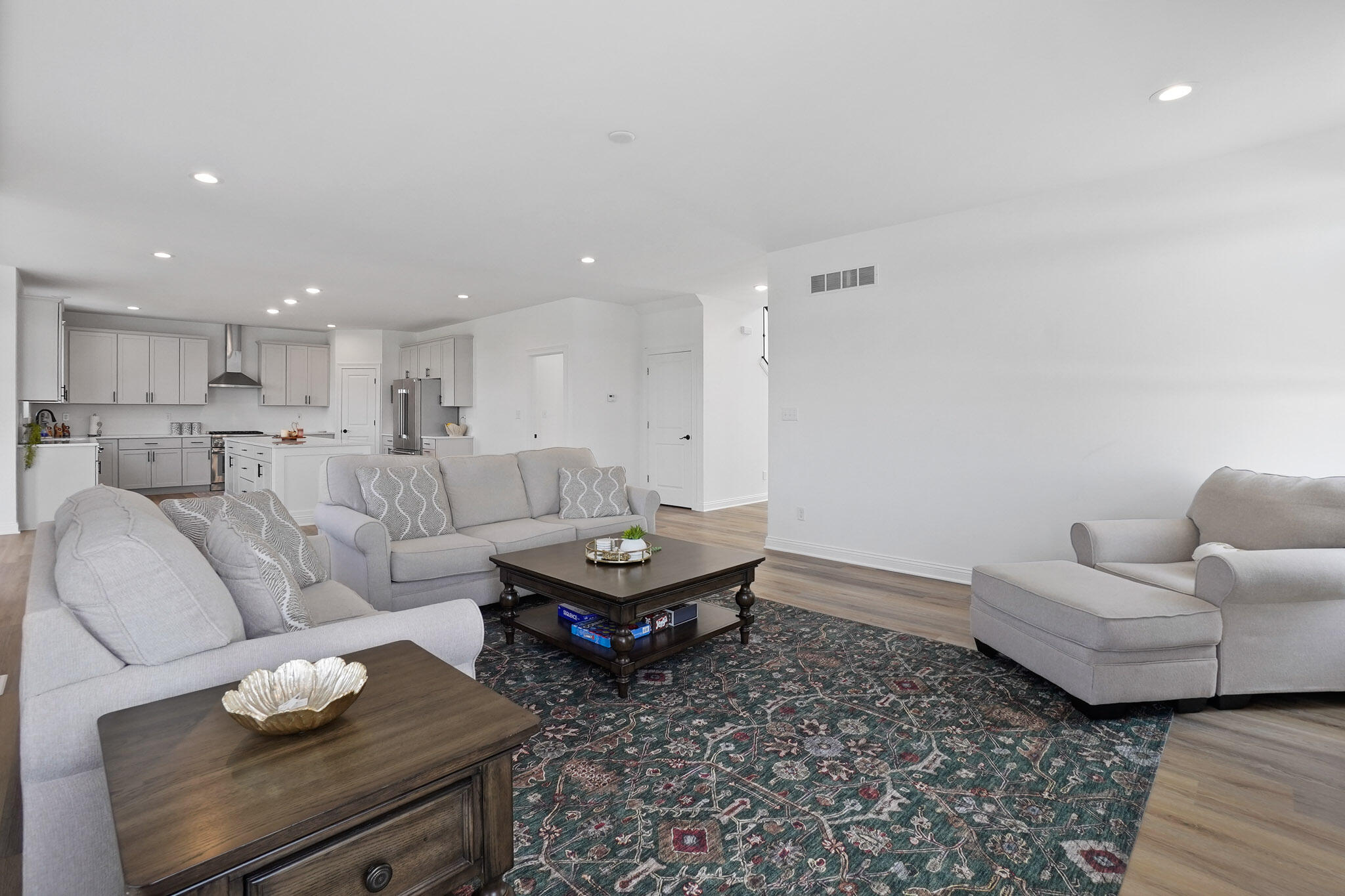 8772 Potomac Way Lowell, IN 46356 - Photo 6 of 30 a living room with furniture and a wooden floor