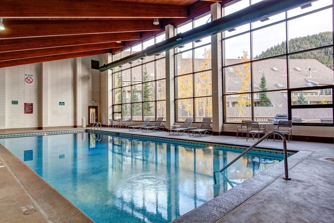21650 Highway 6, Unit 2110 Keystone, CO 80435 - Photo 24 of 26 a view of swimming pool with outdoor seating
