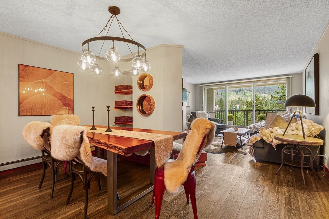 21650 Highway 6, Unit 2110 Keystone, CO 80435 - Photo 10 of 26 a outdoor dining room with furniture and wooden floor
