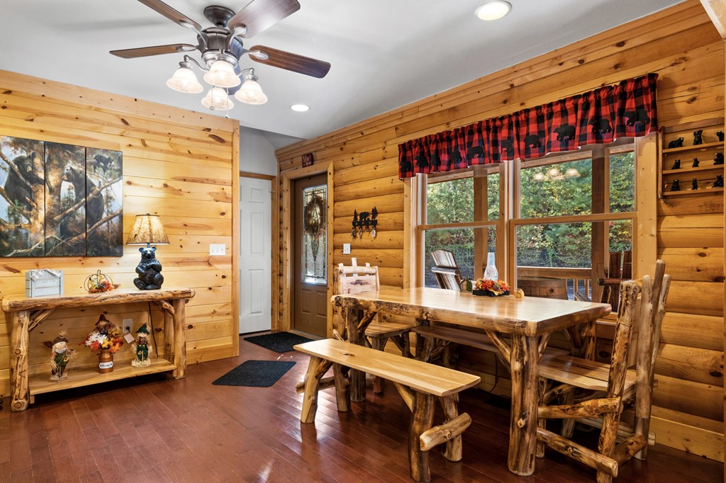 358 Misty River Circle Murphy, NC 28906 - Photo 14 of 62 a view of a dining room with furniture window and wooden floor
