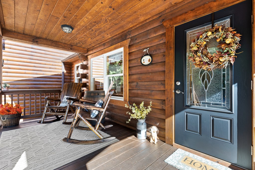 358 Misty River Circle Murphy, NC 28906 - Photo 4 of 62 a view of a patio with table and chairs and potted plants