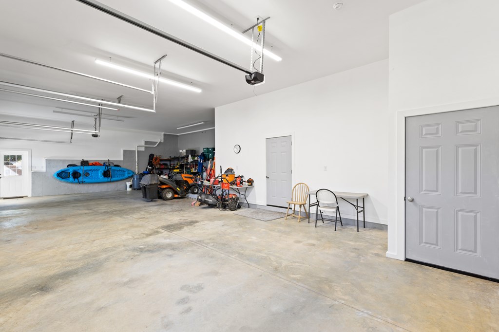 358 Misty River Circle Murphy, NC 28906 - Photo 46 of 62 a view of a garage with a table and chairs