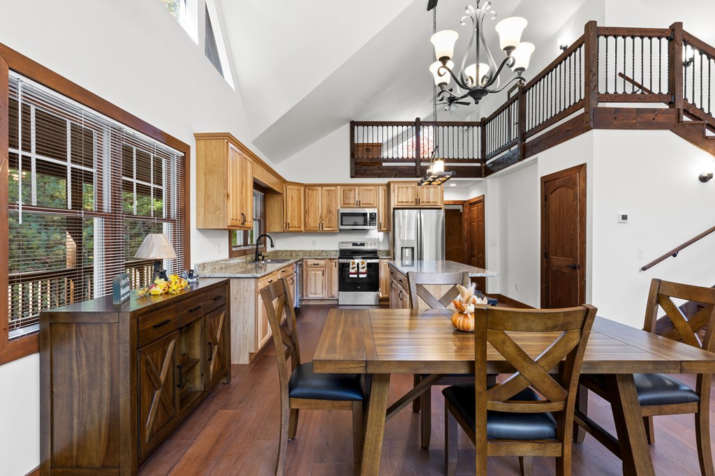 358 Misty River Circle Murphy, NC 28906 - Photo 52 of 62 a dining room with furniture and wooden floor