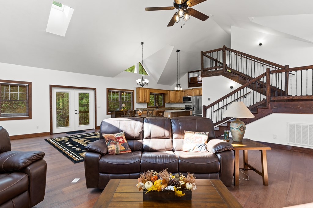 358 Misty River Circle Murphy, NC 28906 - Photo 53 of 62 a living room with furniture ceiling fan and a window
