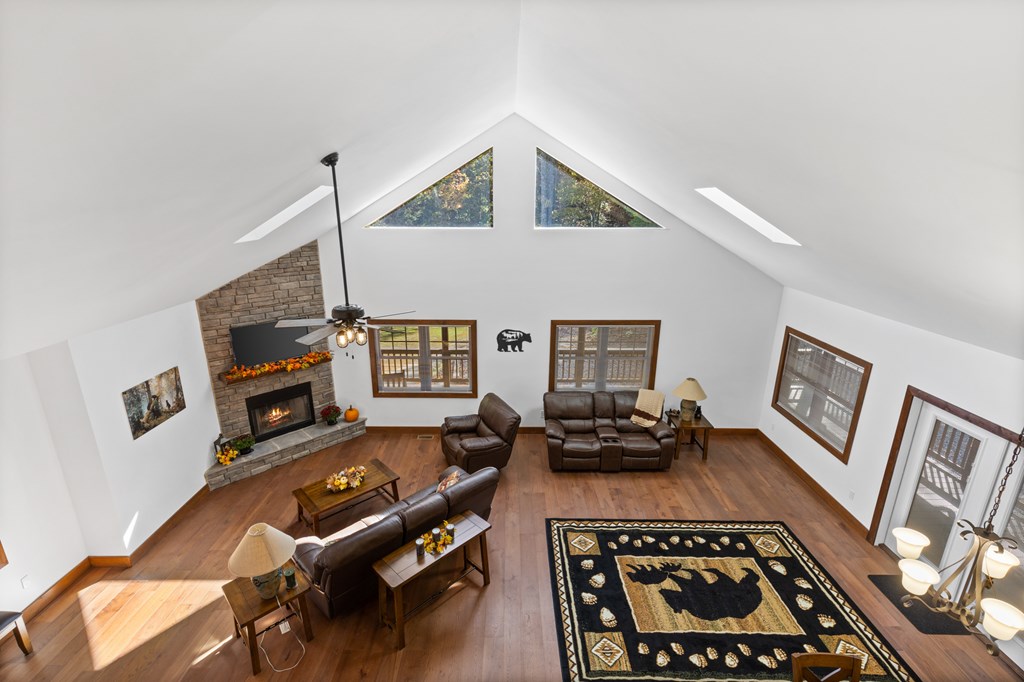 358 Misty River Circle Murphy, NC 28906 - Photo 60 of 62 a living room with furniture and a fireplace