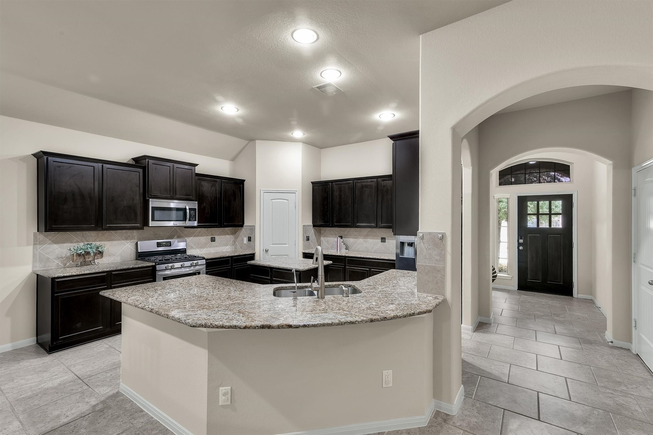 22526 Forbes Field Trail Spring, TX 77389 - Photo 5 of 35 Great Island Kitchen makes holiday entertaining a breeze.