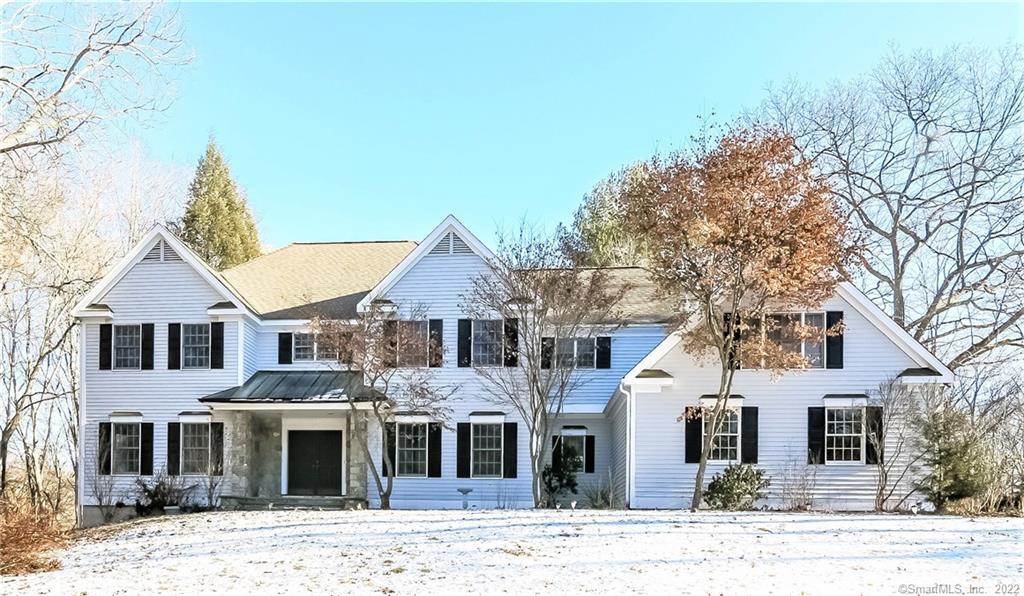 152 Georgetown Road Weston, CT 06883 - Photo 1 of 1 front view of a house with a yard