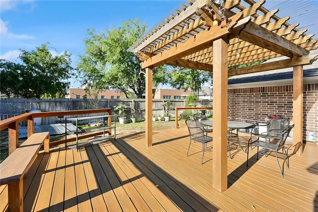a view of swimming pool with seating area