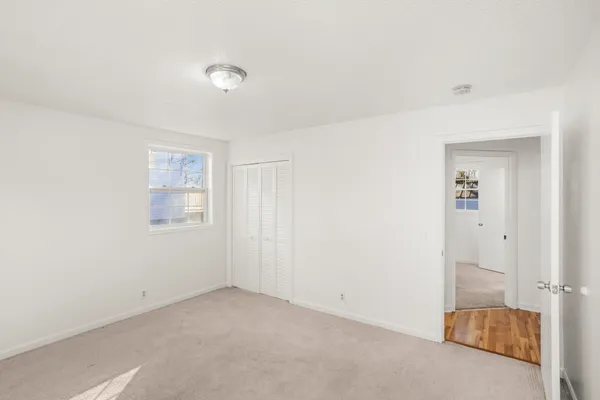 an empty room with windows