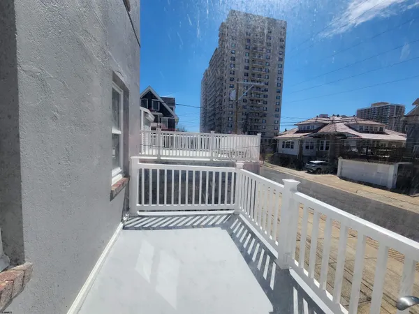 a view of a balcony with an outdoor space