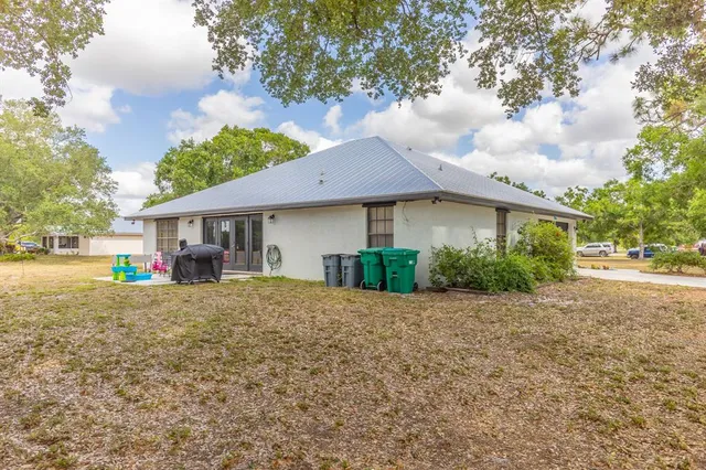 a view of a house with a big yard