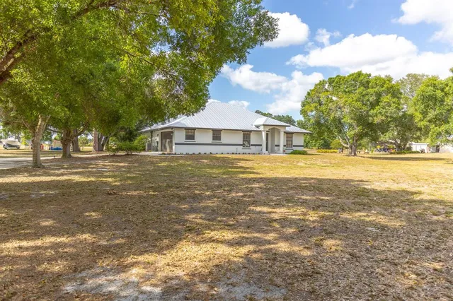 a view of swimming pool from a lake