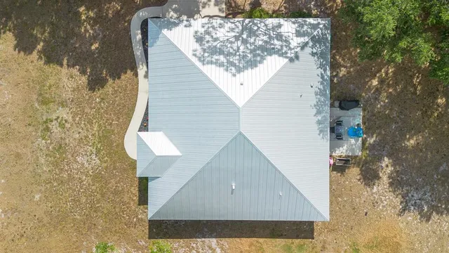 a view of a balcony with ocean view