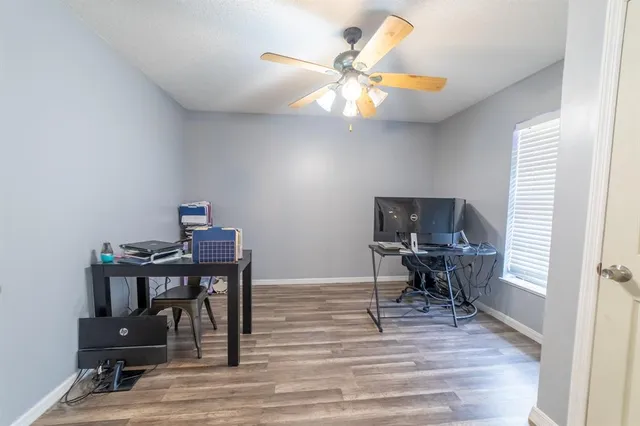 a kitchen with stainless steel appliances granite countertop a stove top oven a sink a counter top space and cabinets