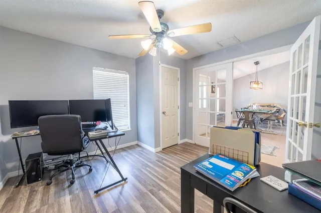 a kitchen with stainless steel appliances a refrigerator stove microwave and sink