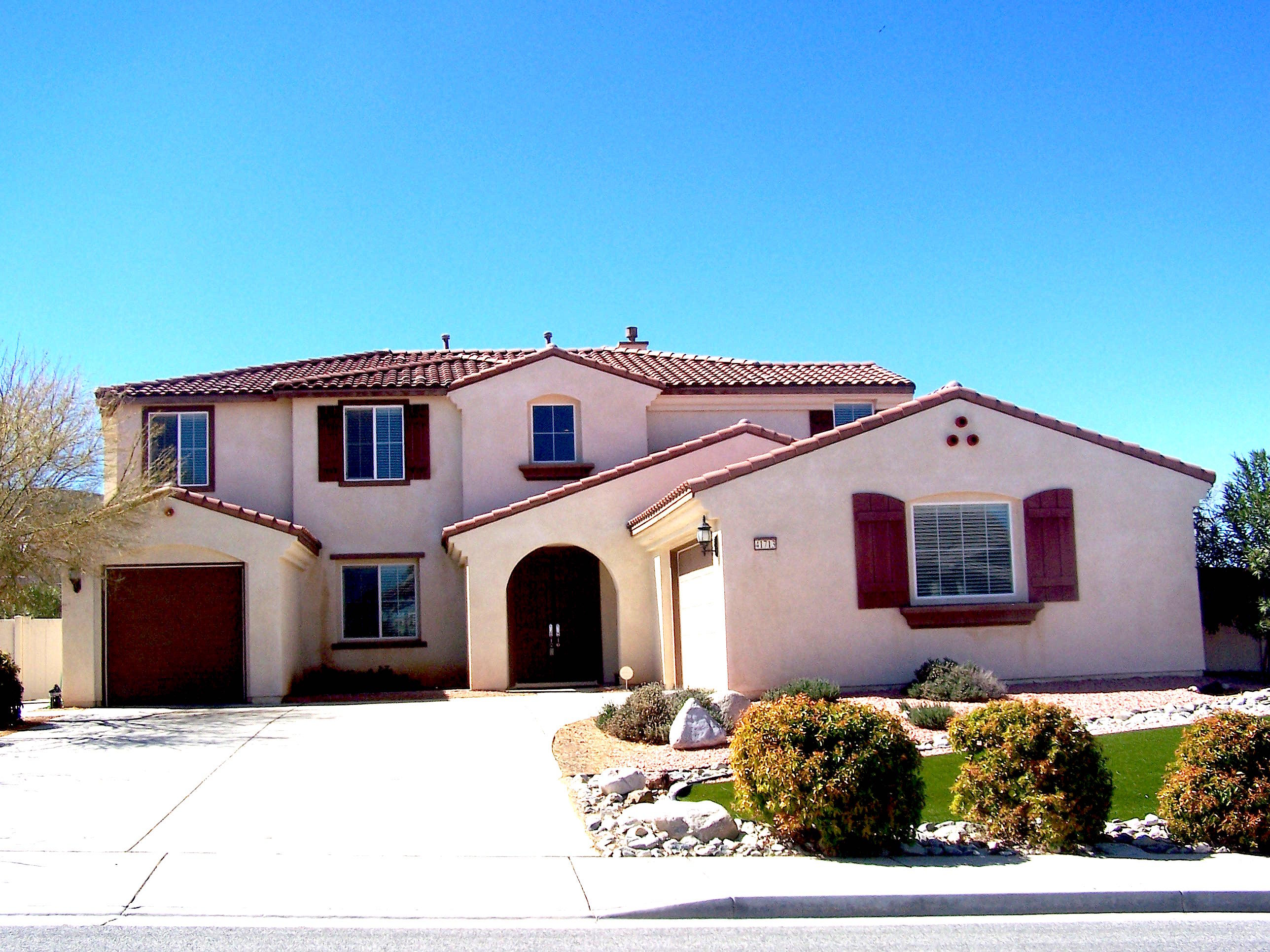 41713 Retsina Street Palmdale, CA 93551 - Photo 1 of 20 a front view of a house with a rug
