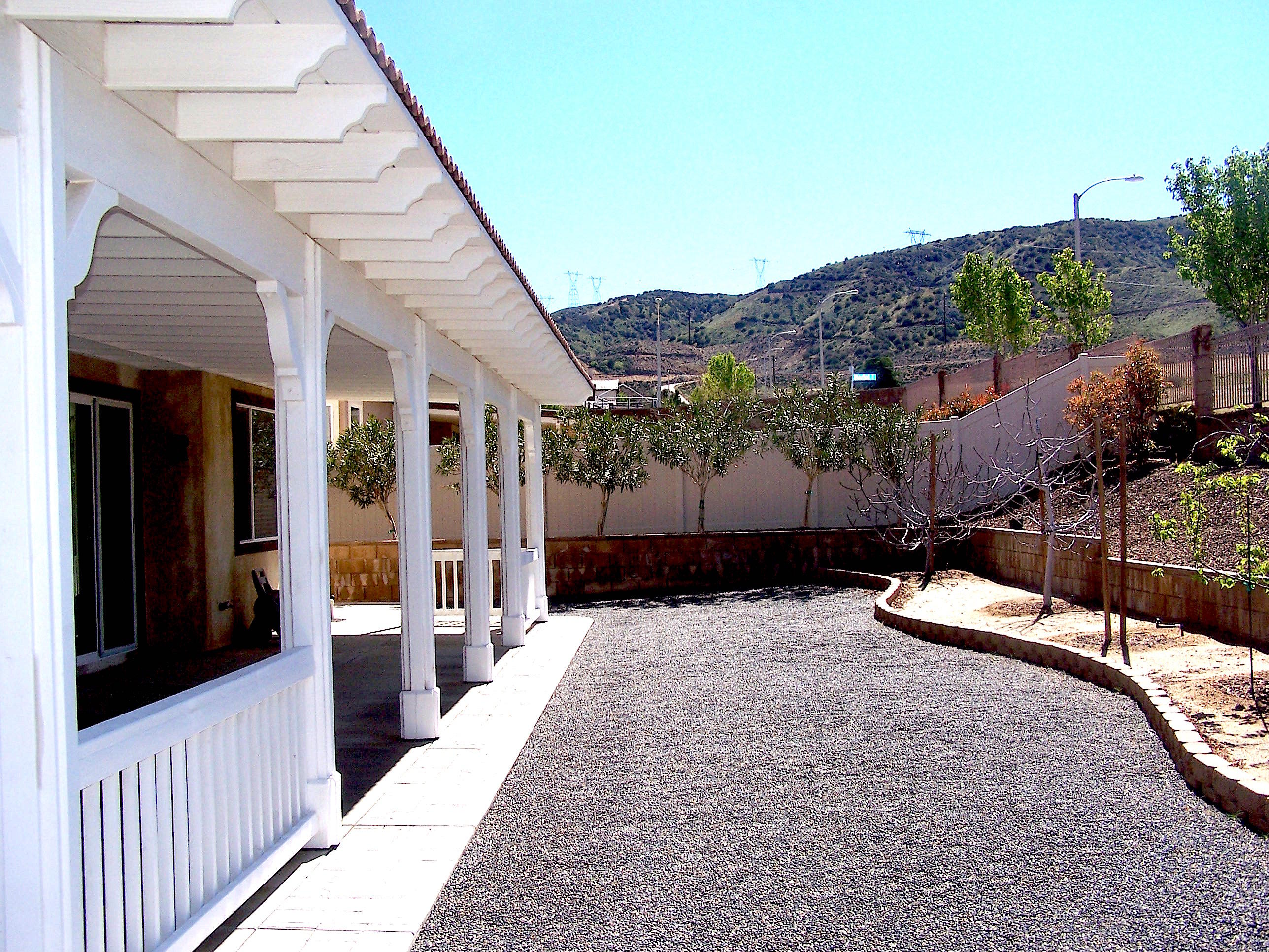 41713 Retsina Street Palmdale, CA 93551 - Photo 19 of 20 a view of a porch with a bench