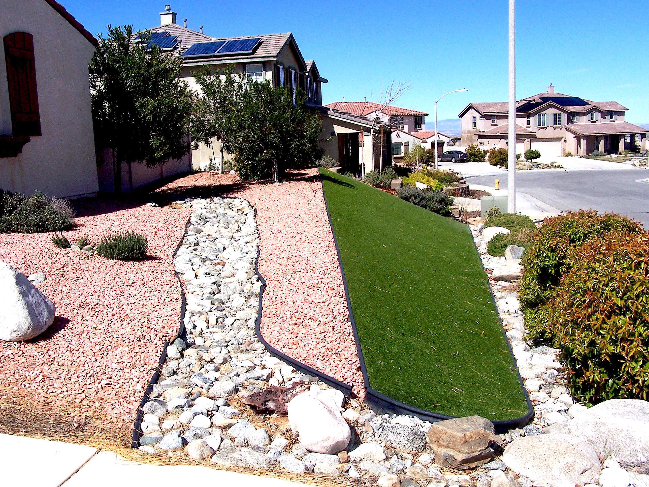 41713 Retsina Street Palmdale, CA 93551 - Photo 3 of 20 a view of a backyard with plants