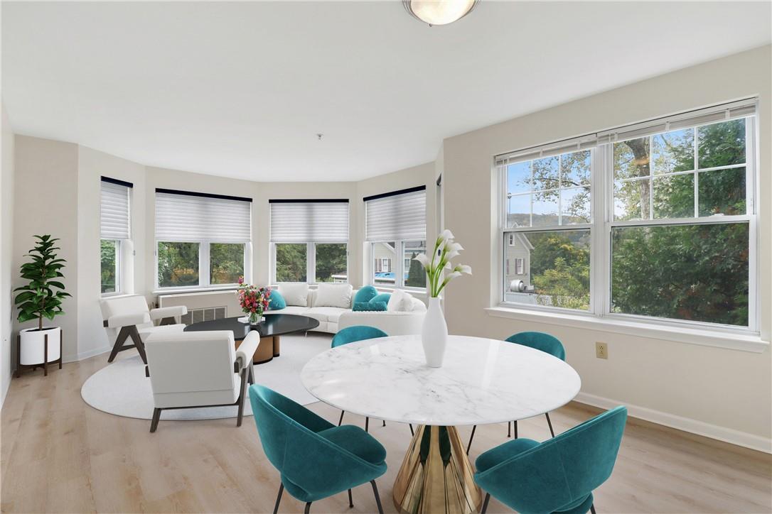 Living/dining. Virtually staged.
