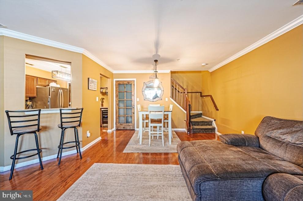 1202 Wharton Road Mount Laurel, NJ 08054 - Photo 11 of 31 a living room with furniture and a wooden floor