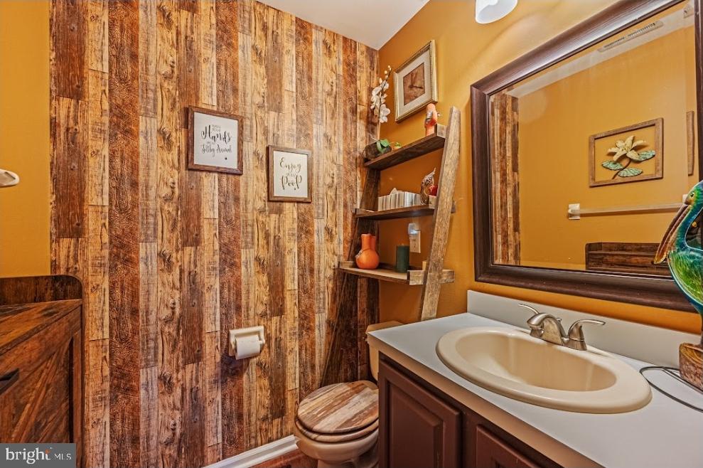1202 Wharton Road Mount Laurel, NJ 08054 - Photo 7 of 31 a bathroom with a sink a toilet and shower curtain