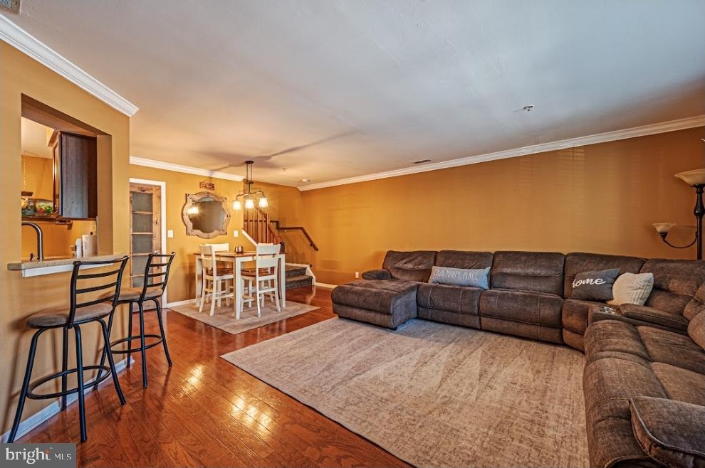 1202 Wharton Road Mount Laurel, NJ 08054 - Photo 8 of 31 a living room with furniture and wooden floor