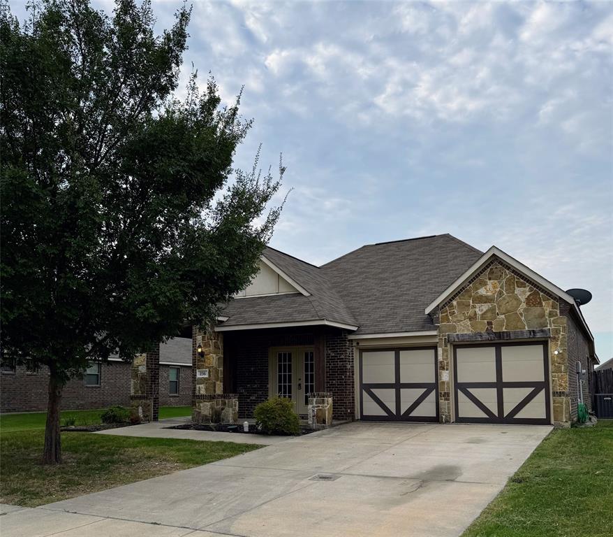 236 Archer Way Forney, TX 75126 - Photo 2 of 35 front view of a house with a street
