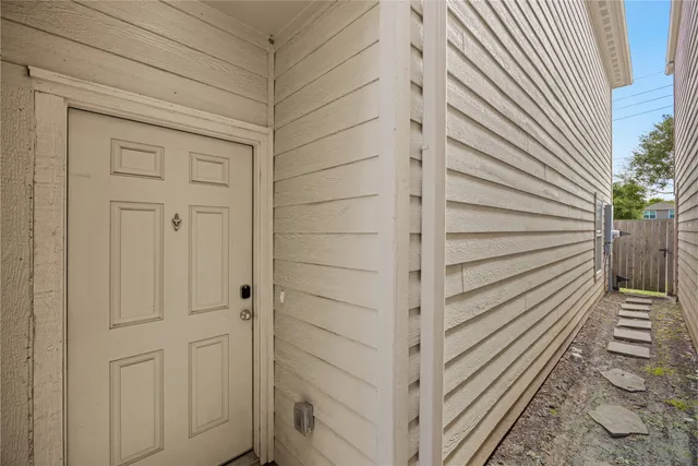 a view of a wooden door and a wooden door