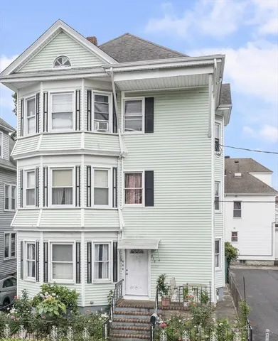 a front view of a building with balcony