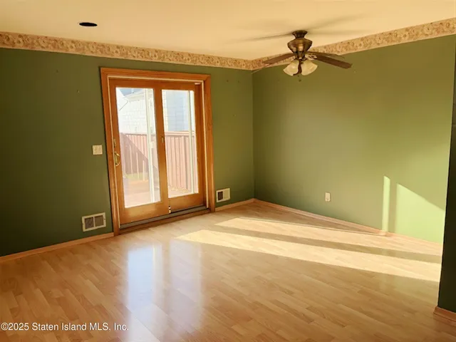 a view of an empty room and window