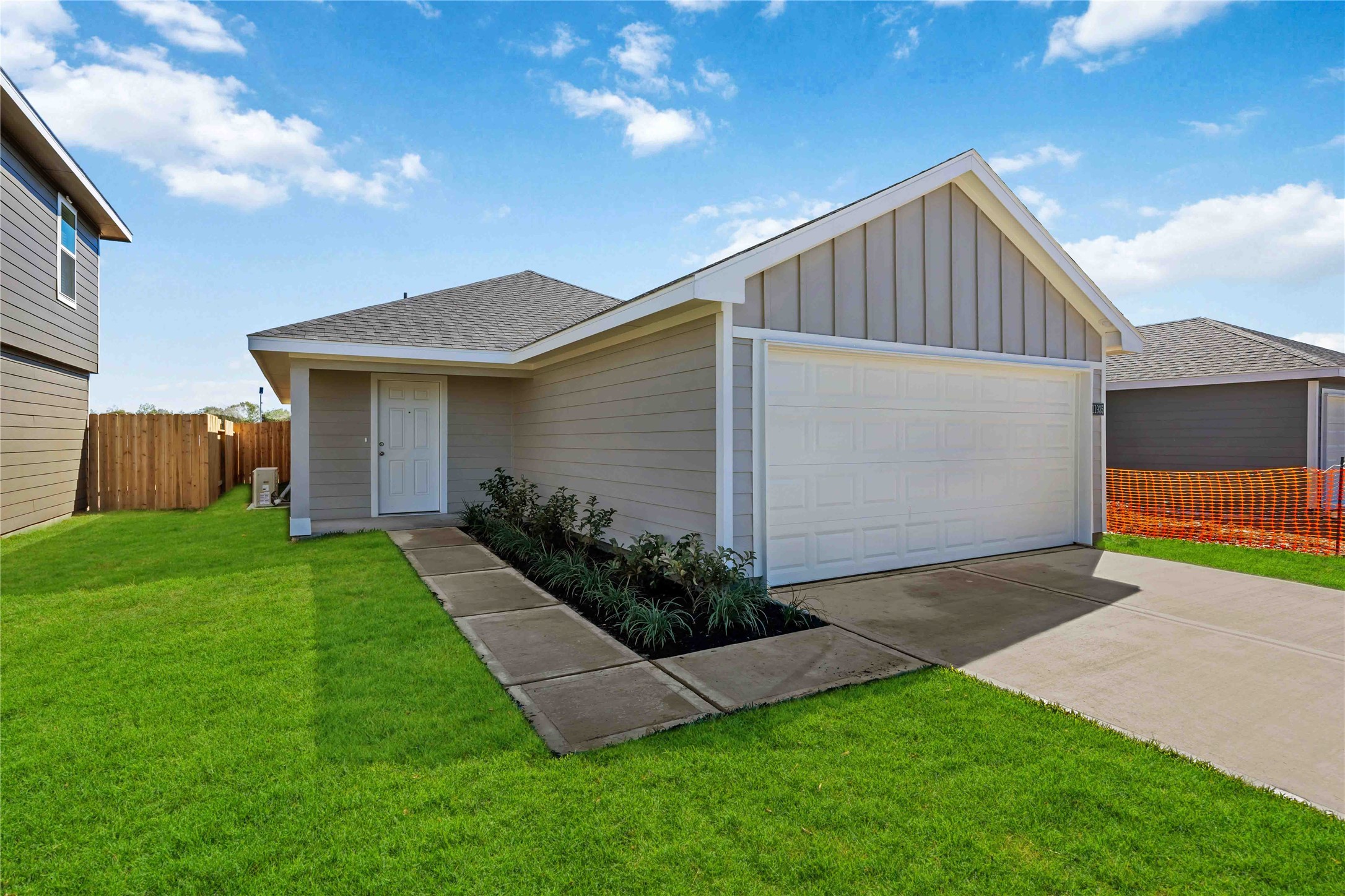 11910 Lilac Ice Lane Houston, TX 77048 - Photo 2 of 17 a view of a house with a yard