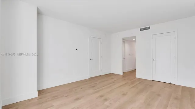 a view of an empty walk in closet
