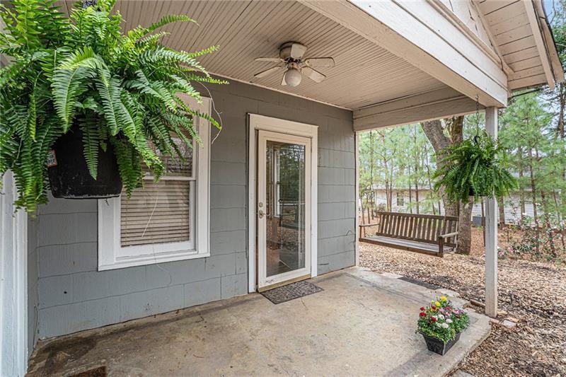 a porch with seating space