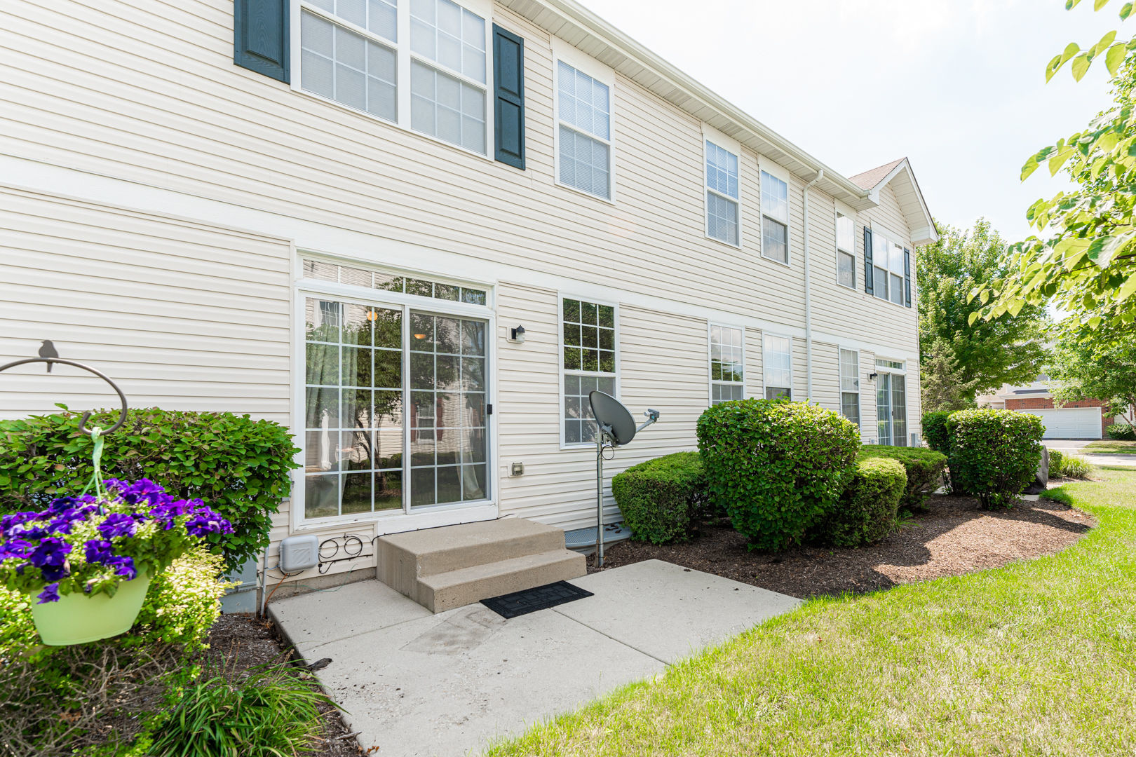 1936 West Cobblestone Road Romeoville, IL 60446 - Photo 24 of 25 a house view with a garden space