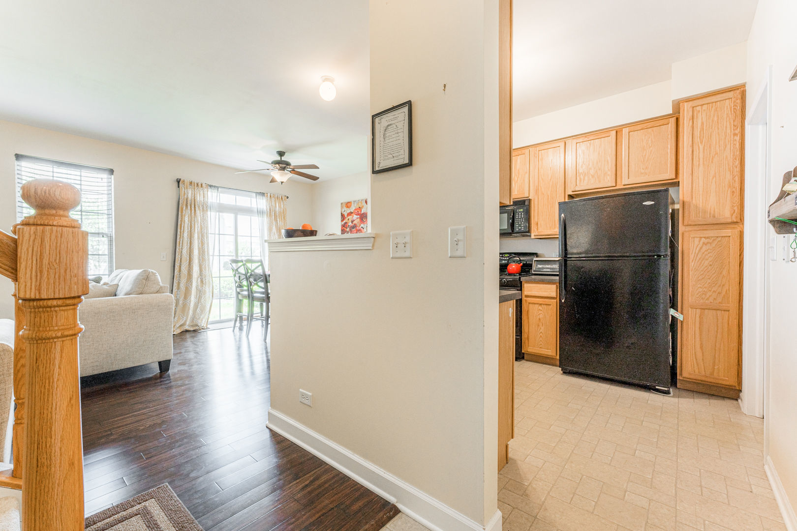 1936 West Cobblestone Road Romeoville, IL 60446 - Photo 3 of 25 a kitchen with stainless steel appliances a refrigerator and a stove top oven