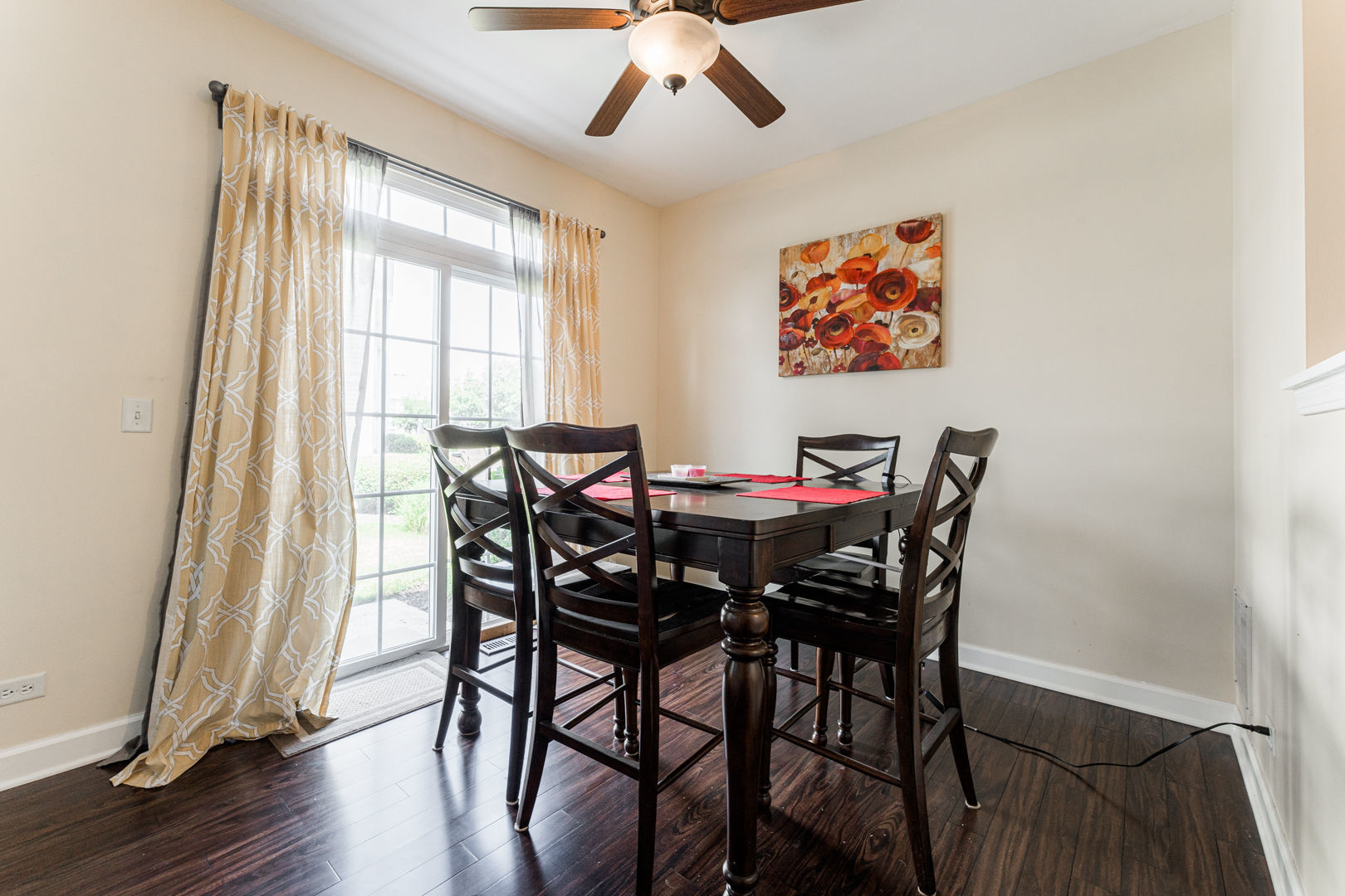 1936 West Cobblestone Road Romeoville, IL 60446 - Photo 8 of 25 a view of a dining room with furniture window and wooden floor