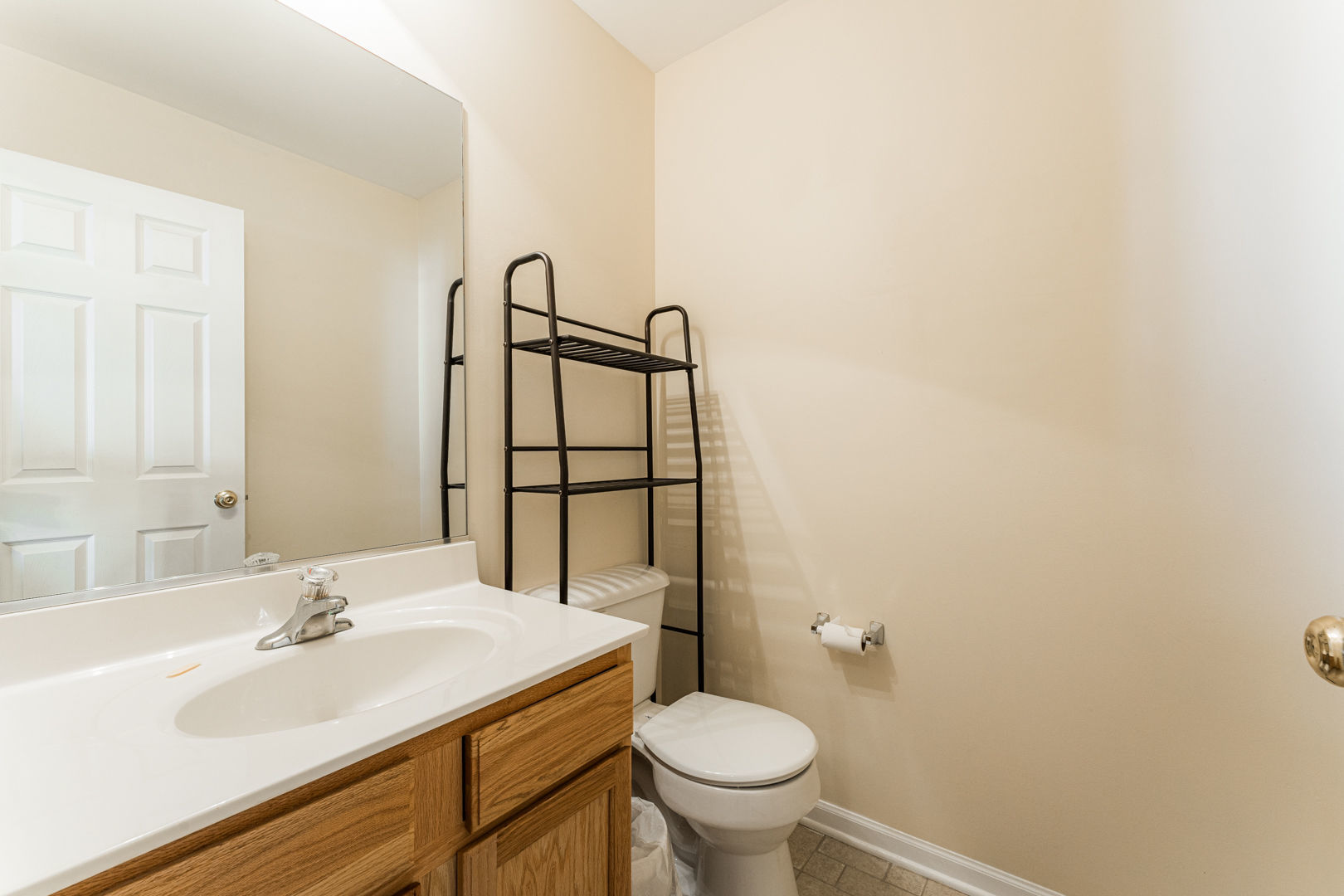 1936 West Cobblestone Road Romeoville, IL 60446 - Photo 9 of 25 a bathroom with a sink and a toilet