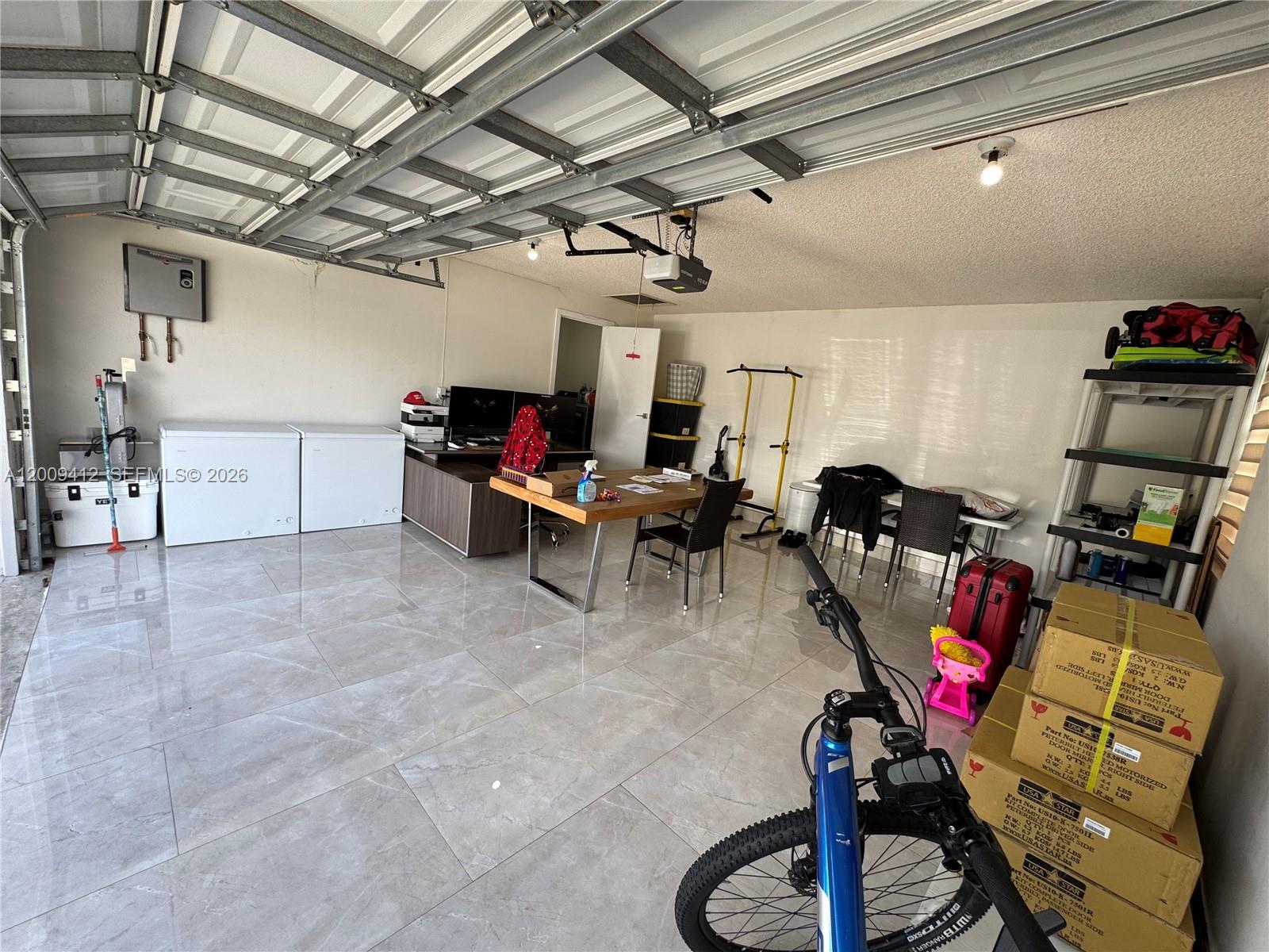 18781 Southwest 294th Terrace Homestead, FL 33030 - Photo 29 of 44 a view of a room with gym equipment