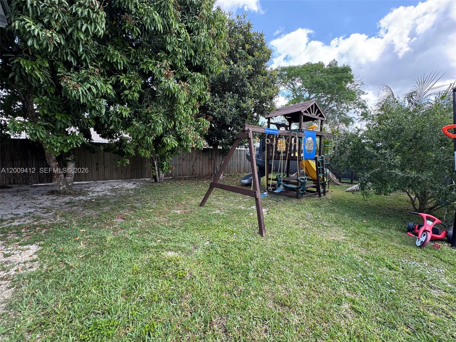 18781 Southwest 294th Terrace Homestead, FL 33030 - Photo 38 of 44 a view of a park with slide