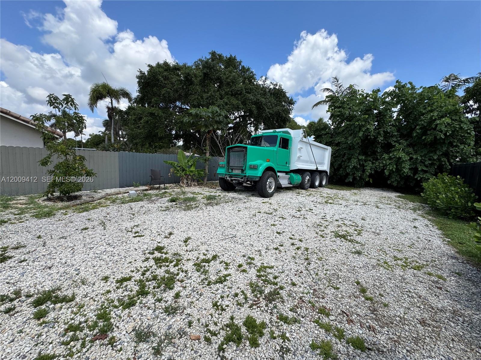 18781 Southwest 294th Terrace Homestead, FL 33030 - Photo 42 of 44 a front view of a house with a yard