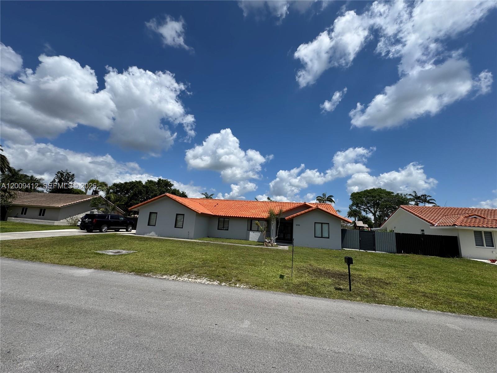 18781 Southwest 294th Terrace Homestead, FL 33030 - Photo 43 of 44 a view of a house with a yard