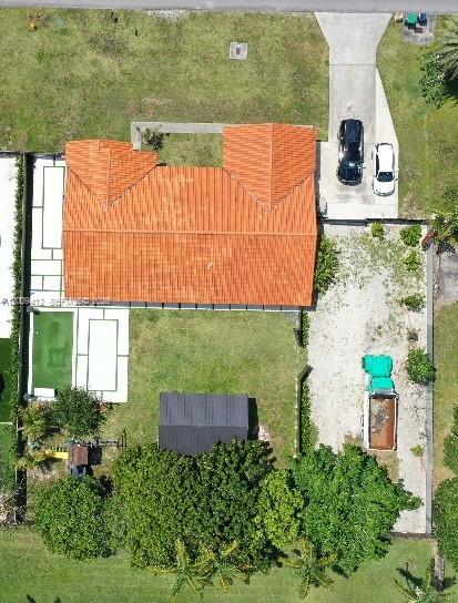 18781 Southwest 294th Terrace Homestead, FL 33030 - Photo 5 of 44 an outdoor sitting area with a lake view