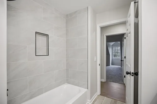 a bathroom with a bathtub